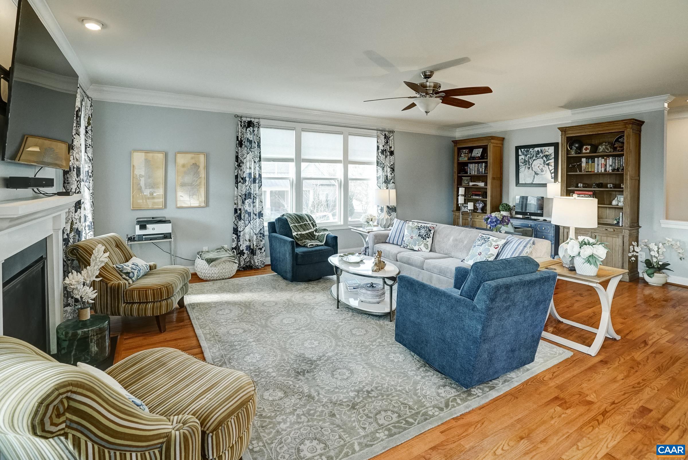 7652 Birchwood Hill Road Crozet, VA 22932 - Photo 17 of 64 a living room with furniture and a flat screen tv