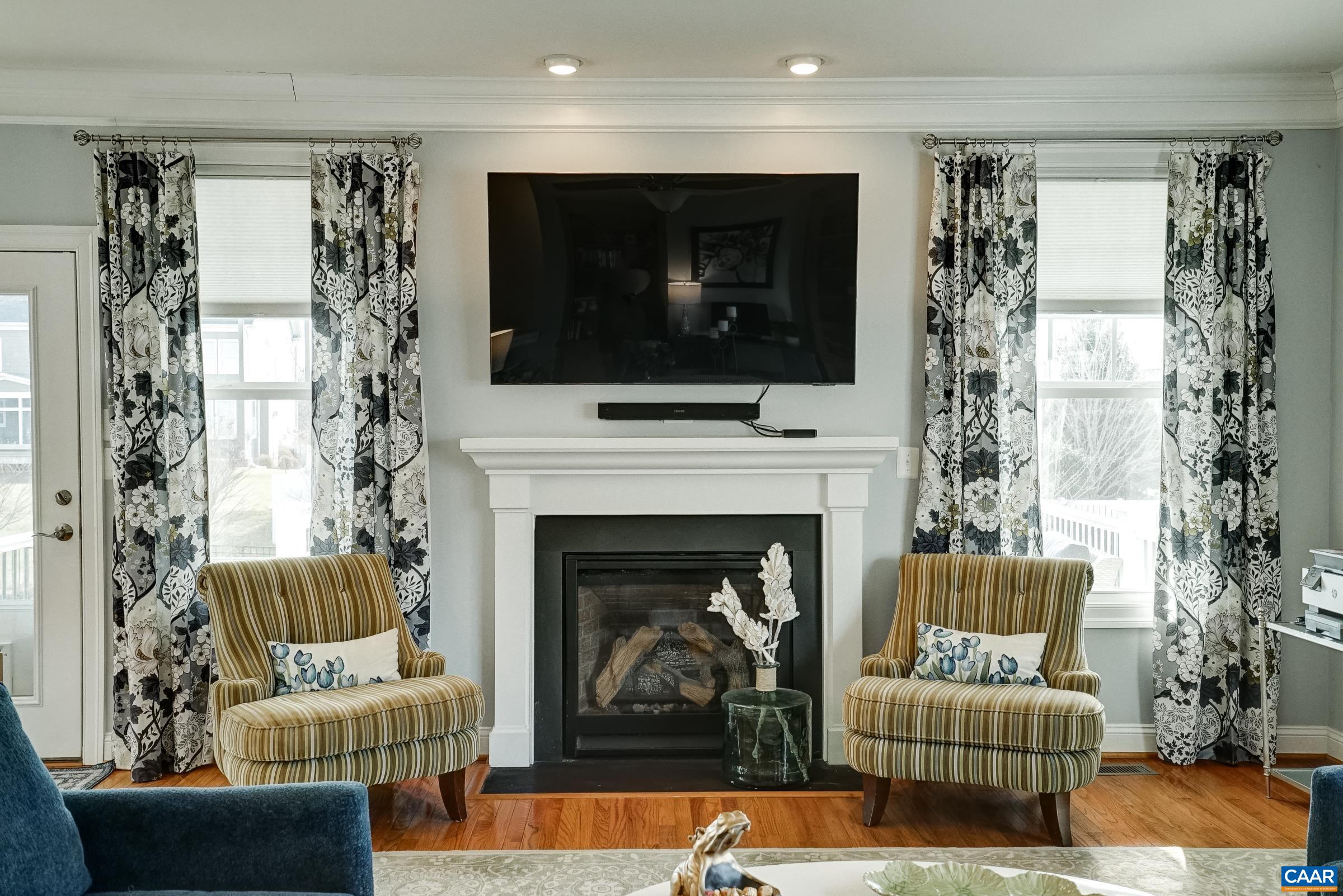 7652 Birchwood Hill Road Crozet, VA 22932 - Photo 20 of 64 a living room with furniture and a fireplace