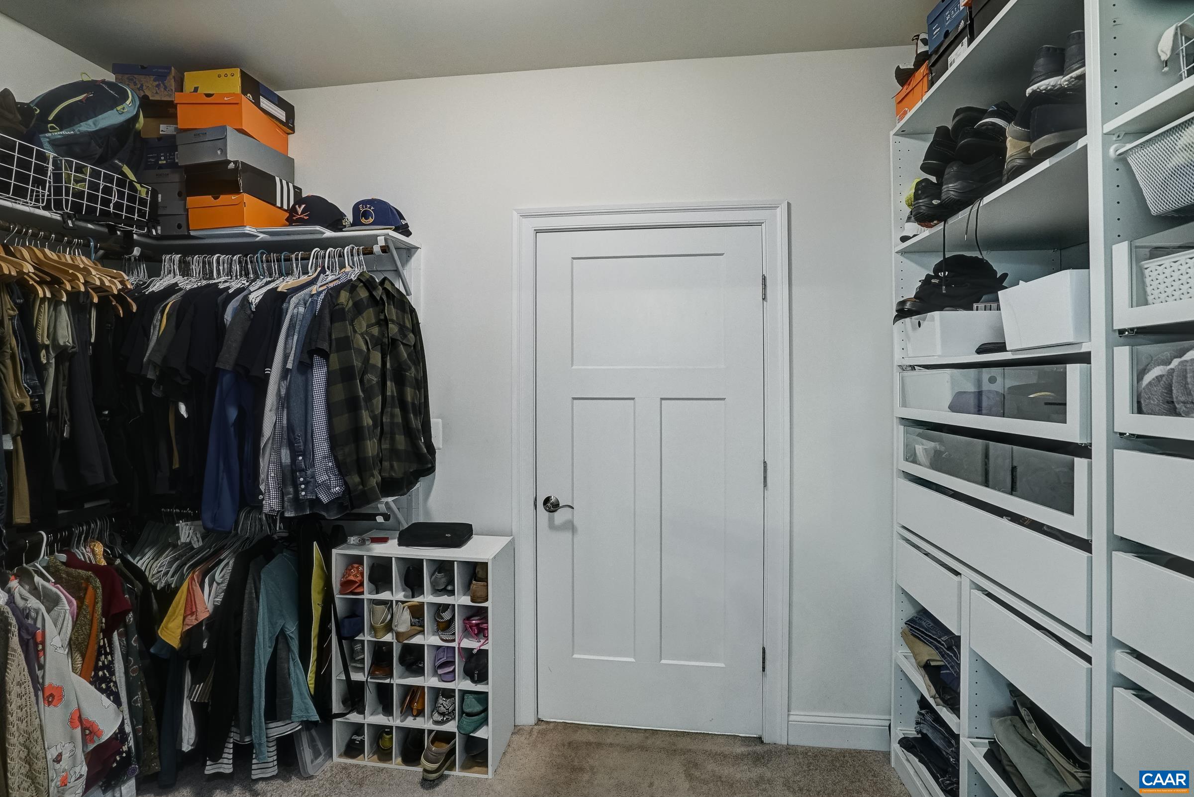 7652 Birchwood Hill Road Crozet, VA 22932 - Photo 33 of 64 a view of walk in closet with clothes and shoes