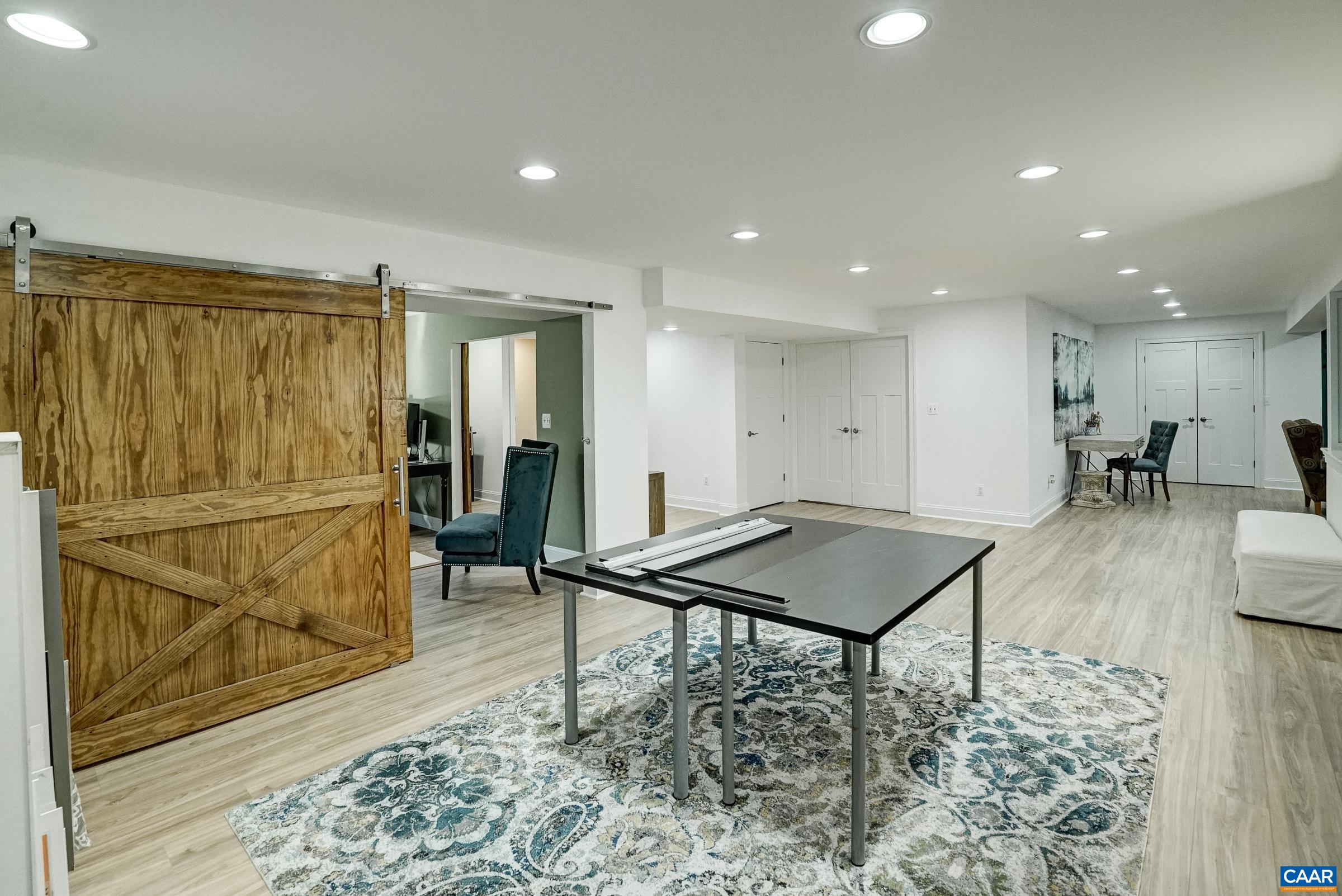 7652 Birchwood Hill Road Crozet, VA 22932 - Photo 45 of 64 a view of a room with furniture and wooden floor