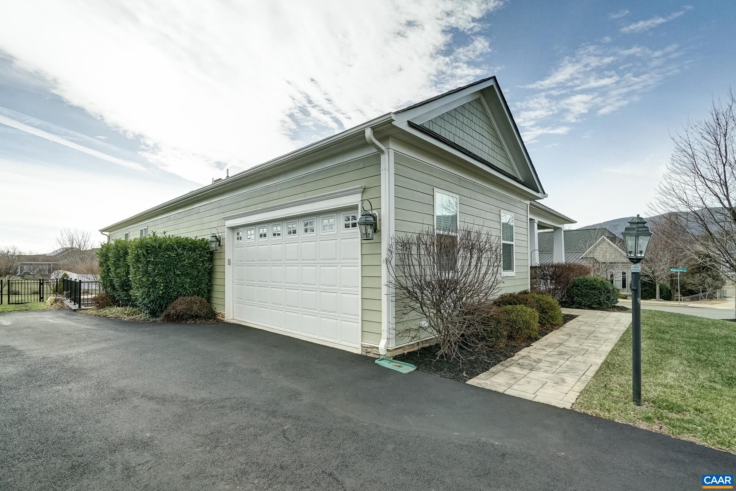 7652 Birchwood Hill Road Crozet, VA 22932 - Photo 56 of 64 a view of a house with a backyard