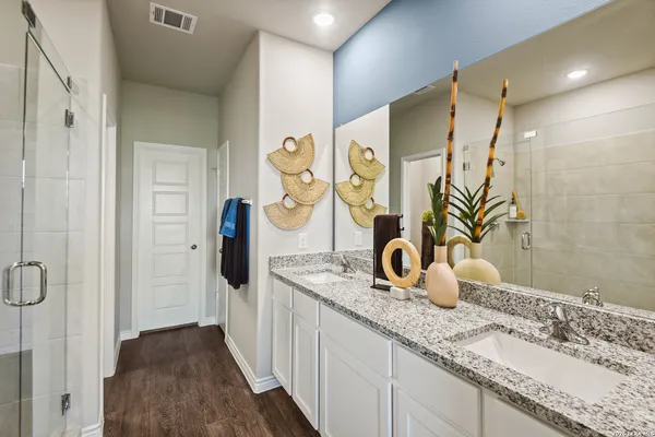 a view of storage and utility room with washer and dryer