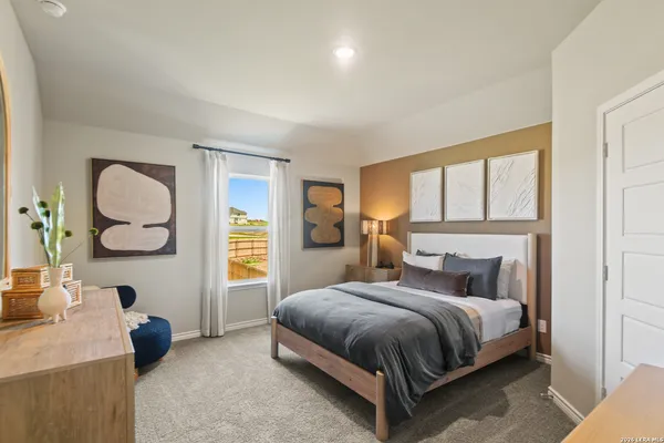 a bed room with a bed and a window