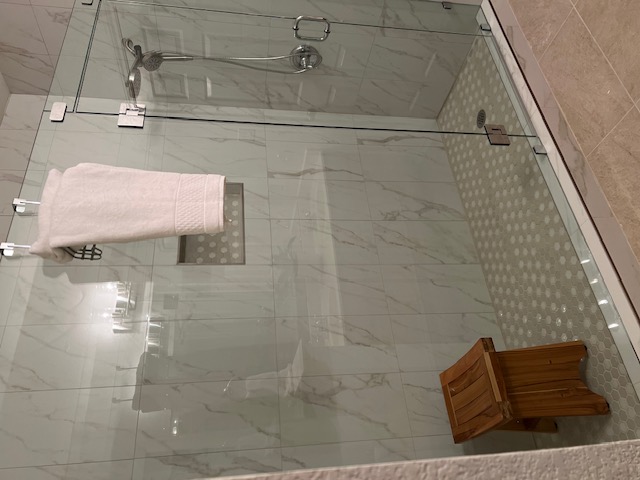 14815 Avery Ranch Boulevard, Unit 19E Austin, TX 78717 - Photo 4 of 4 Bathroom featuring a marble finish shower