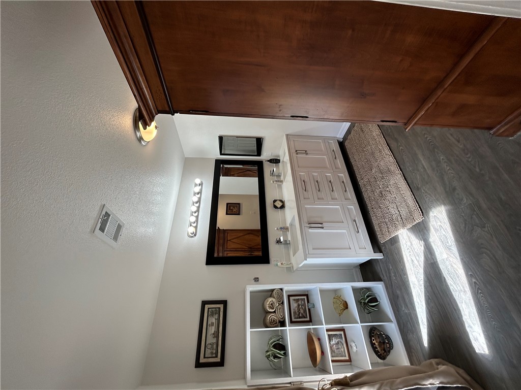 2191 Seneca Street Kingman, AZ 86401 - Photo 5 of 26 a utility room with stainless steel appliances wooden floor and window