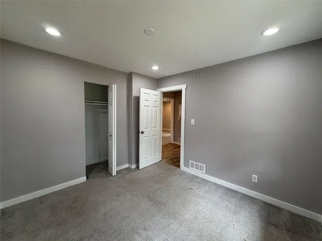 an empty room with an entryway