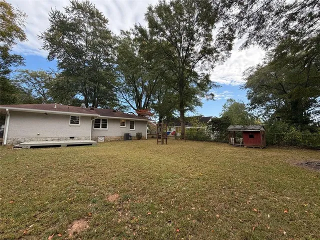 a house view with a garden space