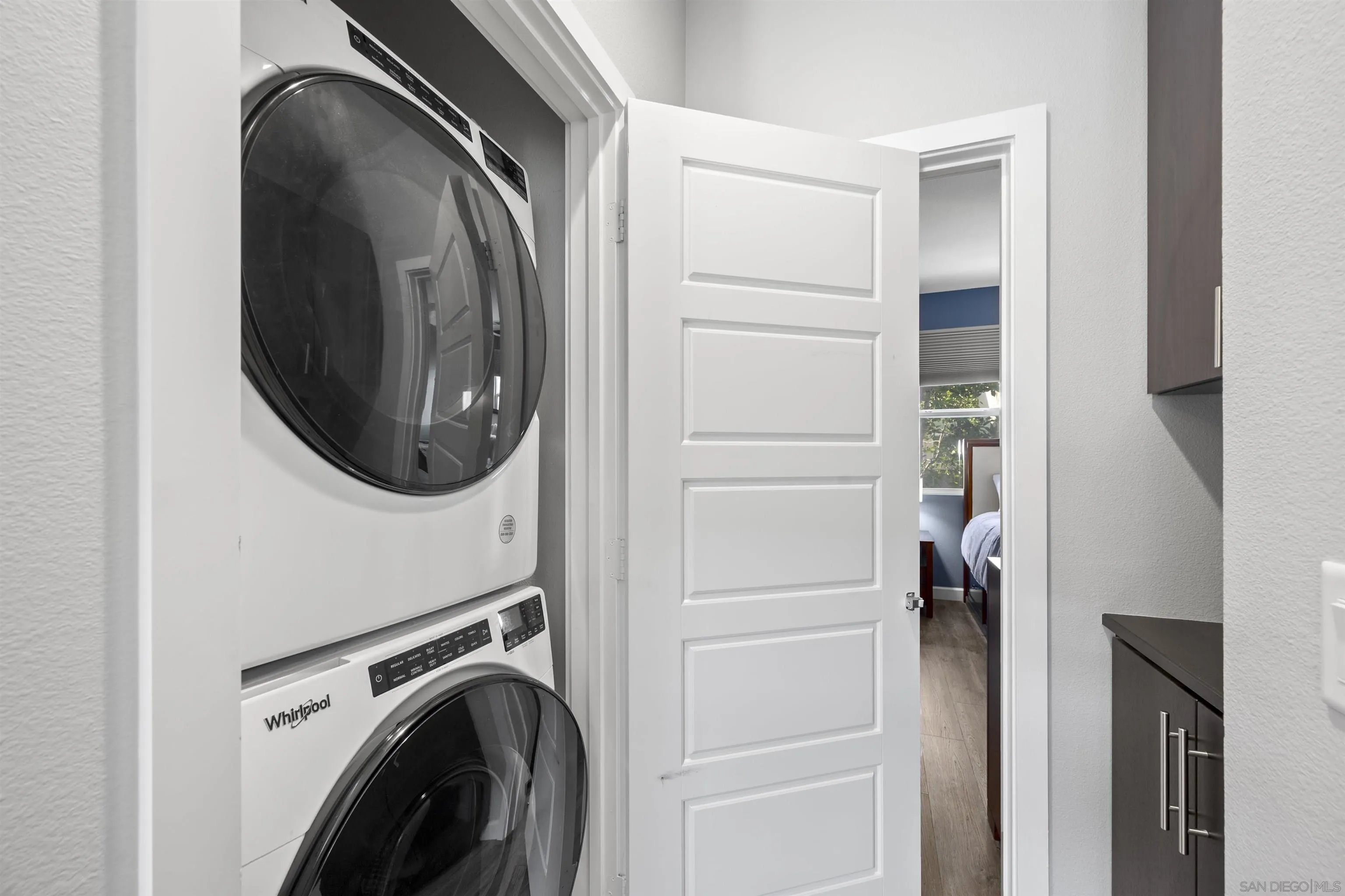 7834 Inception Way San Diego, CA 92108 - Photo 25 of 62 a utility room with dryer and washer