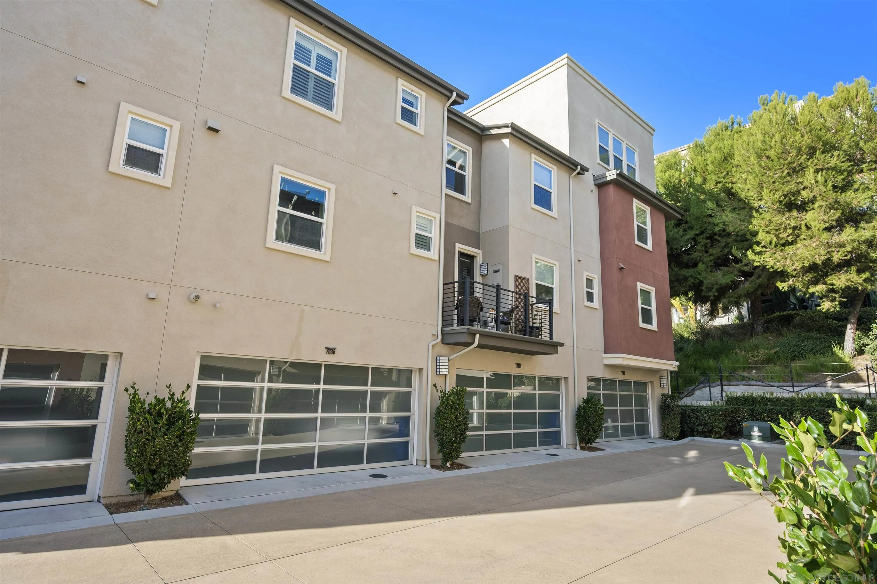 7834 Inception Way San Diego, CA 92108 - Photo 31 of 62 a front view of a building with garden