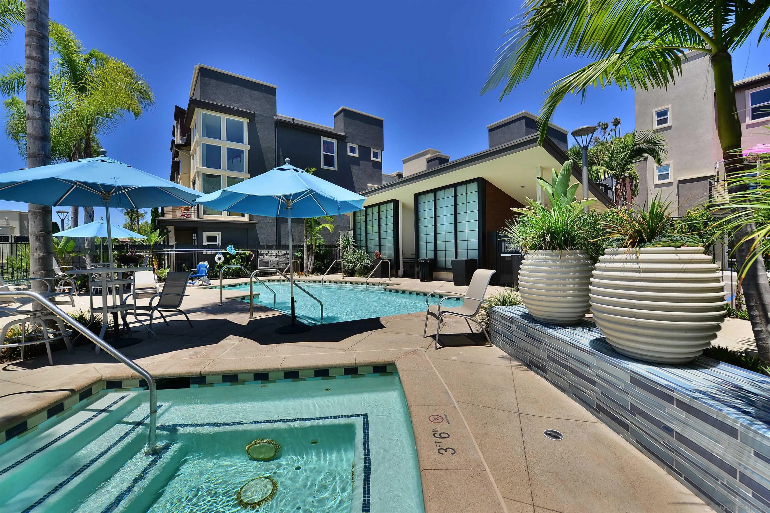 7834 Inception Way San Diego, CA 92108 - Photo 32 of 62 a view of a house with backyard porch and sitting area