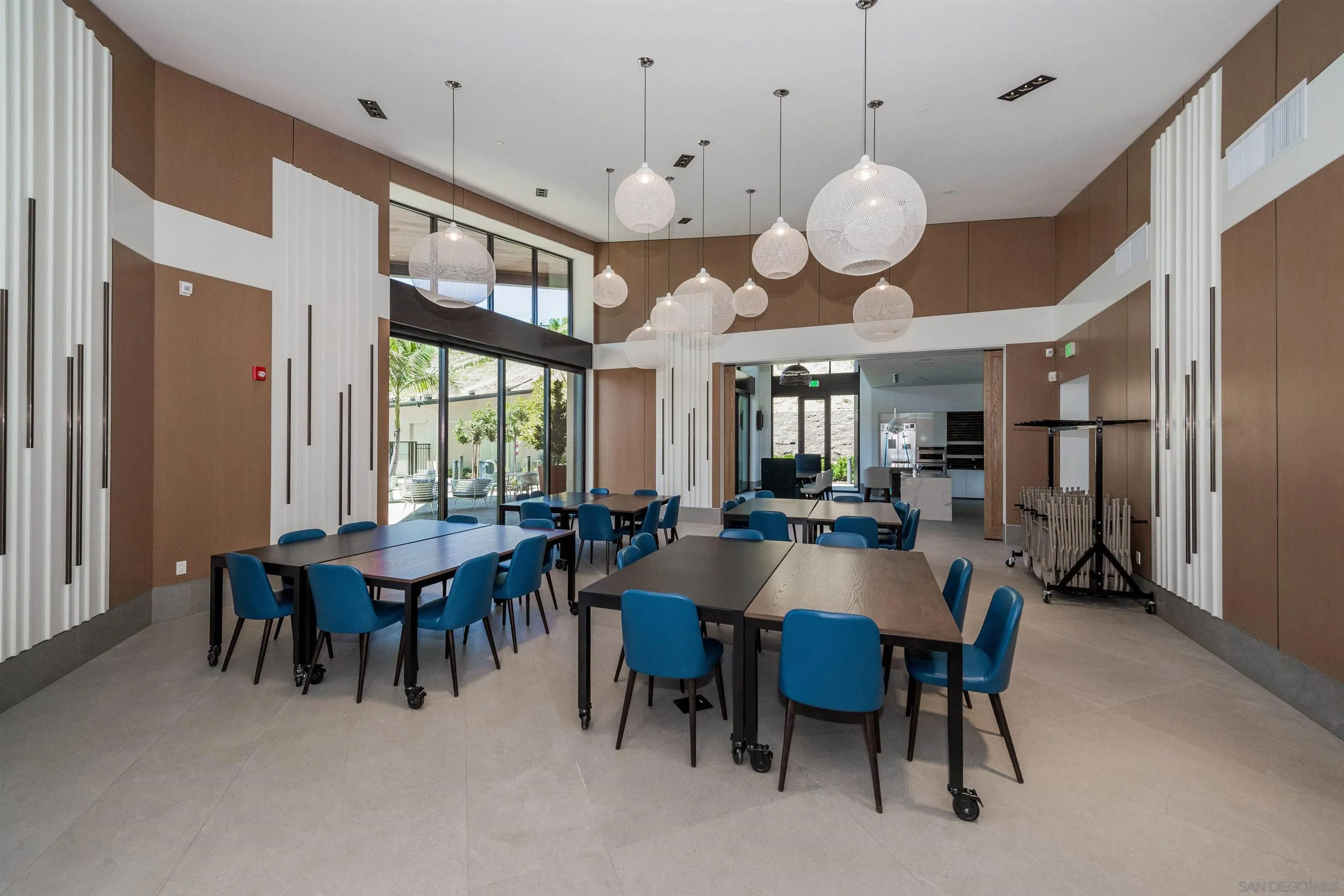 7834 Inception Way San Diego, CA 92108 - Photo 39 of 62 a view of a dining room with furniture and chandelier