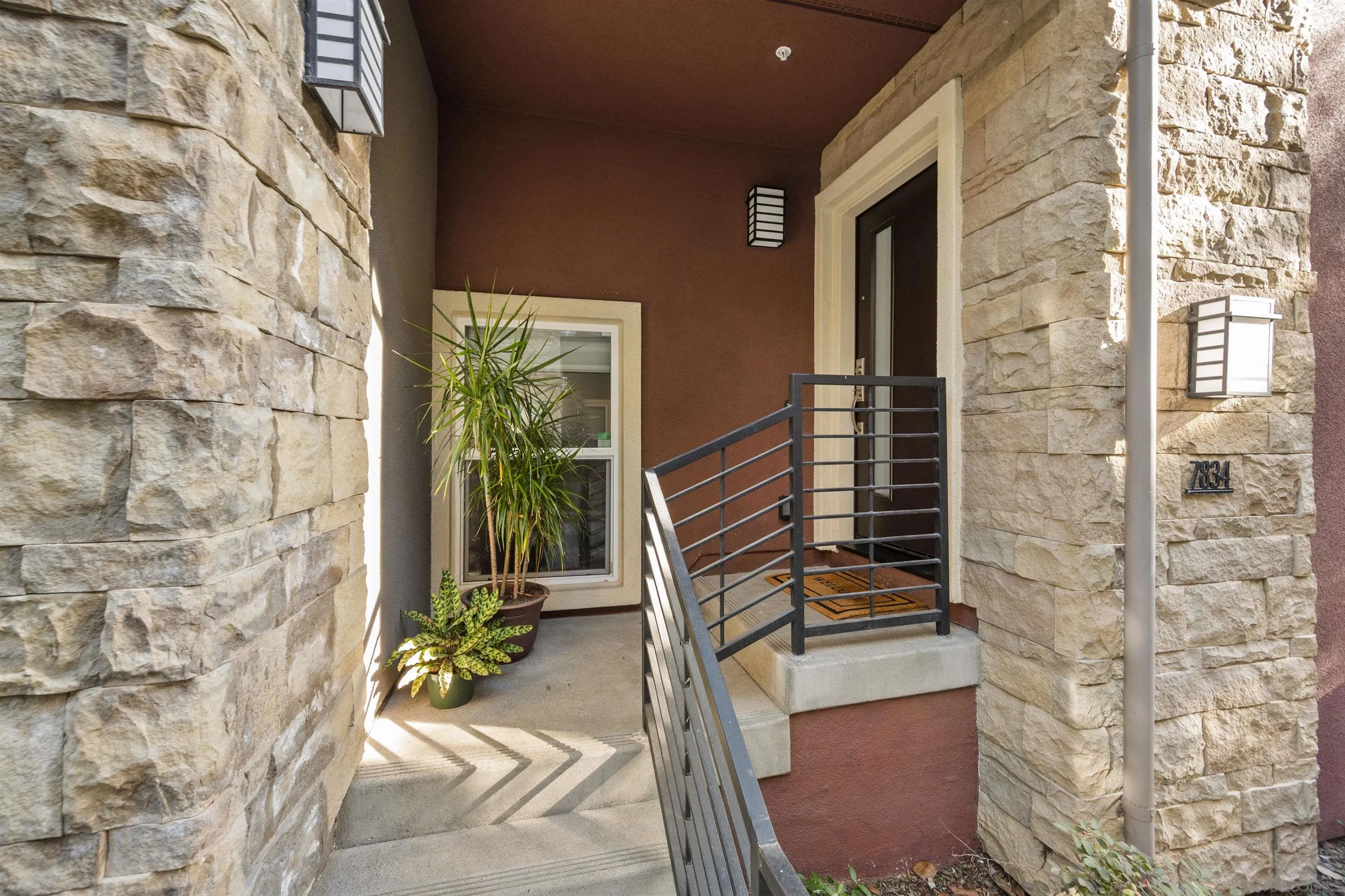 7834 Inception Way San Diego, CA 92108 - Photo 4 of 62 a view of front door of house with stairs