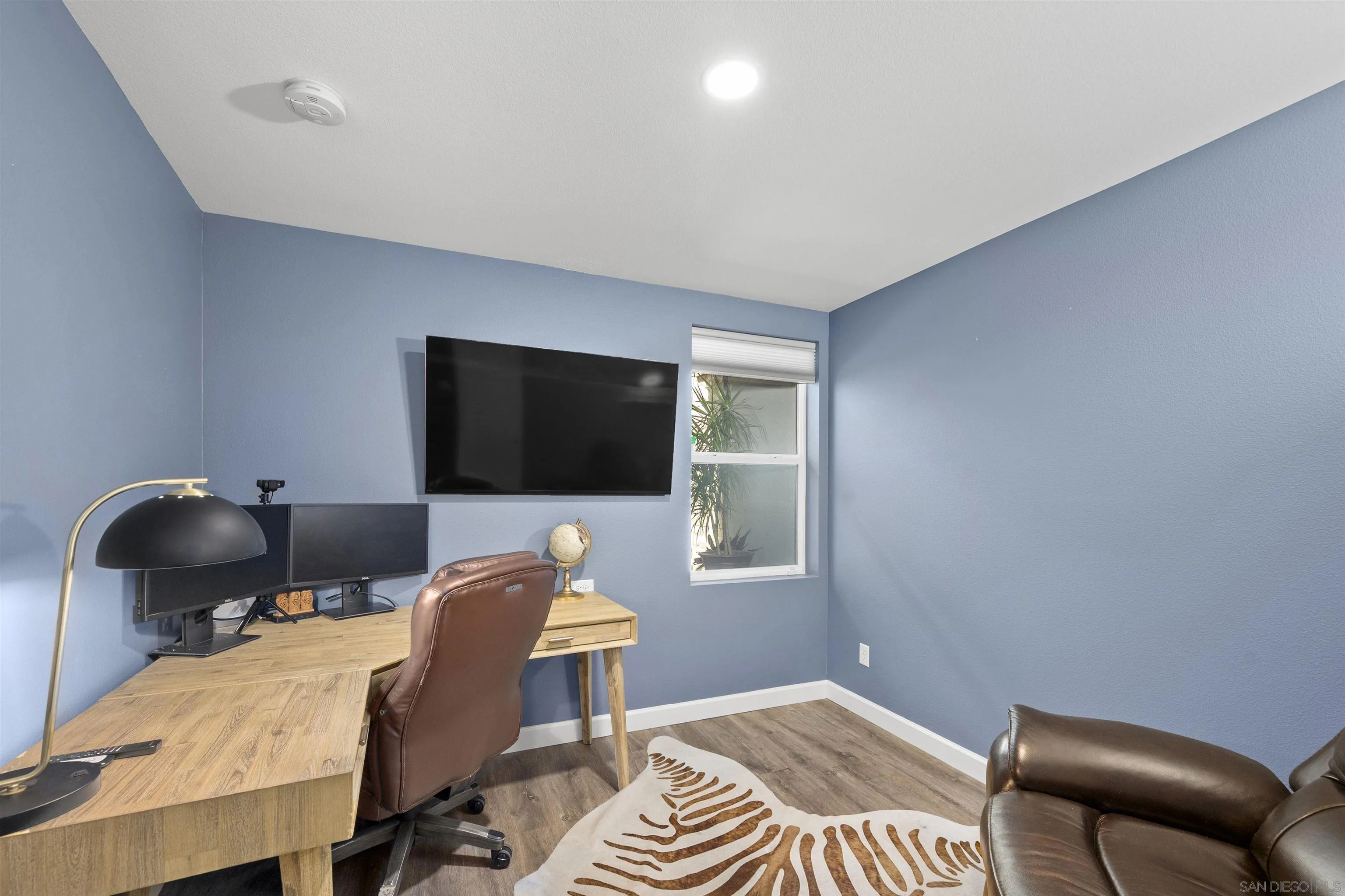 7834 Inception Way San Diego, CA 92108 - Photo 7 of 62 a workspace with furniture and a window