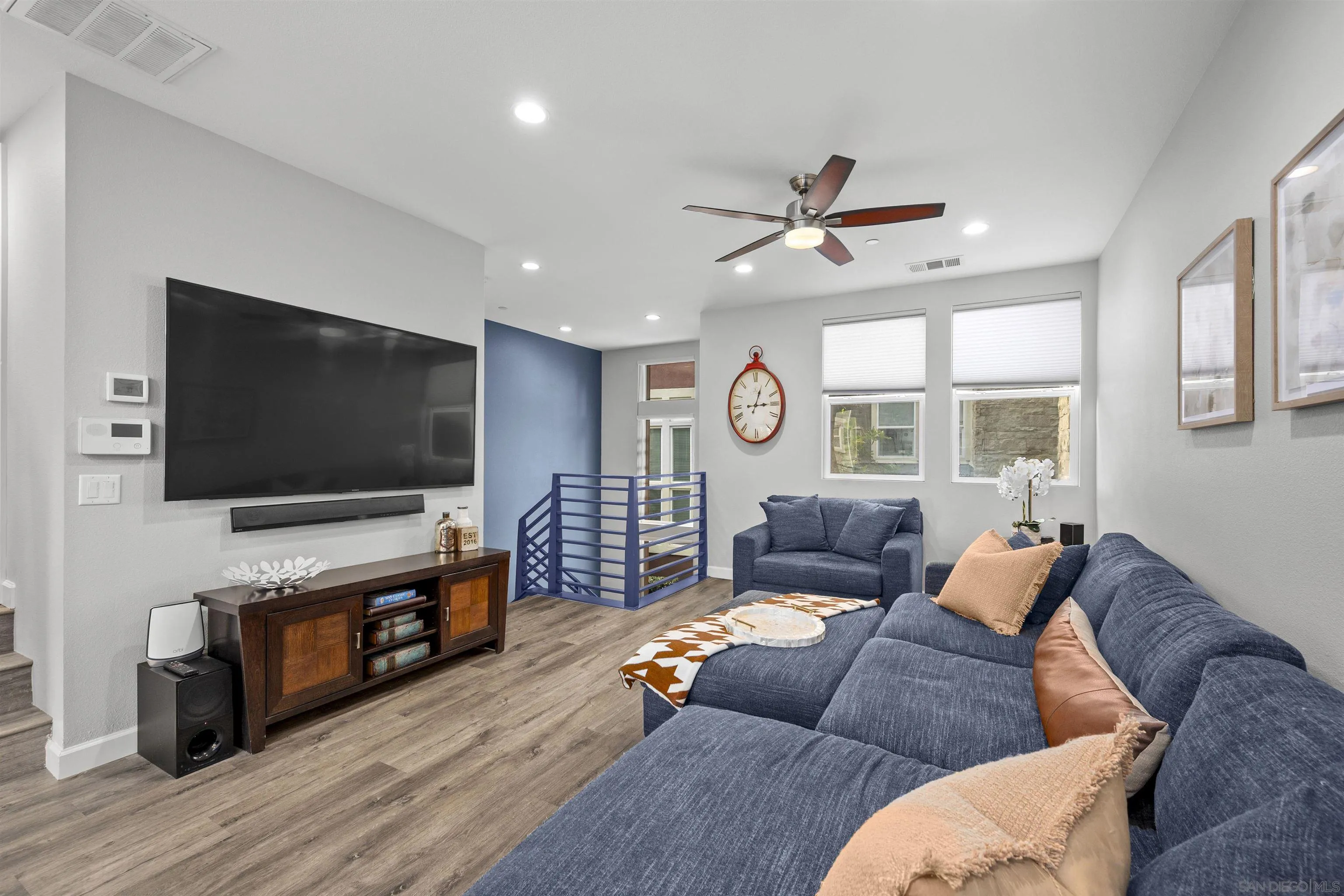 7834 Inception Way San Diego, CA 92108 - Photo 10 of 62 a living room with furniture and a flat screen tv