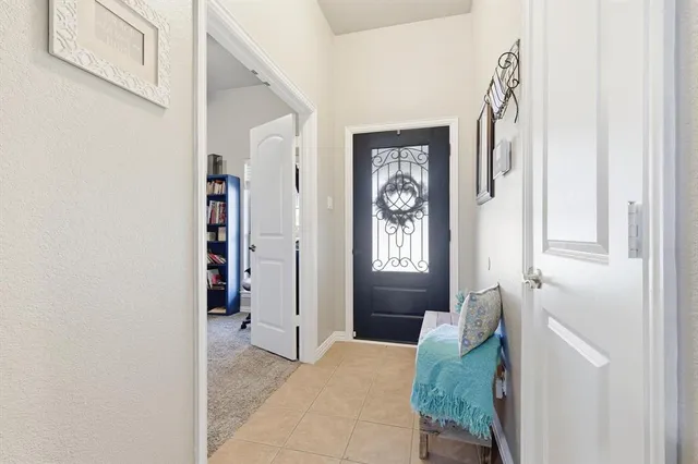 a bedroom with furniture and a fireplace
