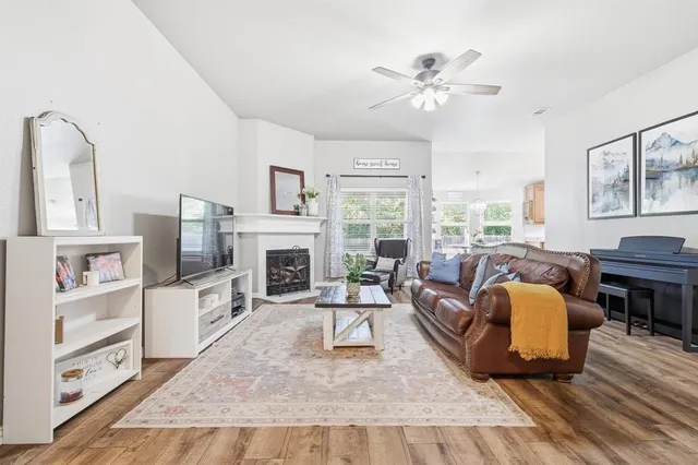 a kitchen with a refrigerator sink and microwave