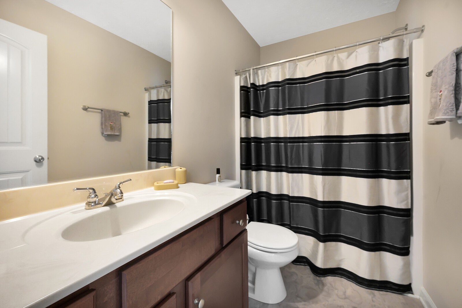 1129 Woodall Road Lebanon, TN 37090 - Photo 12 of 12 a bathroom with a sink a toilet and shower