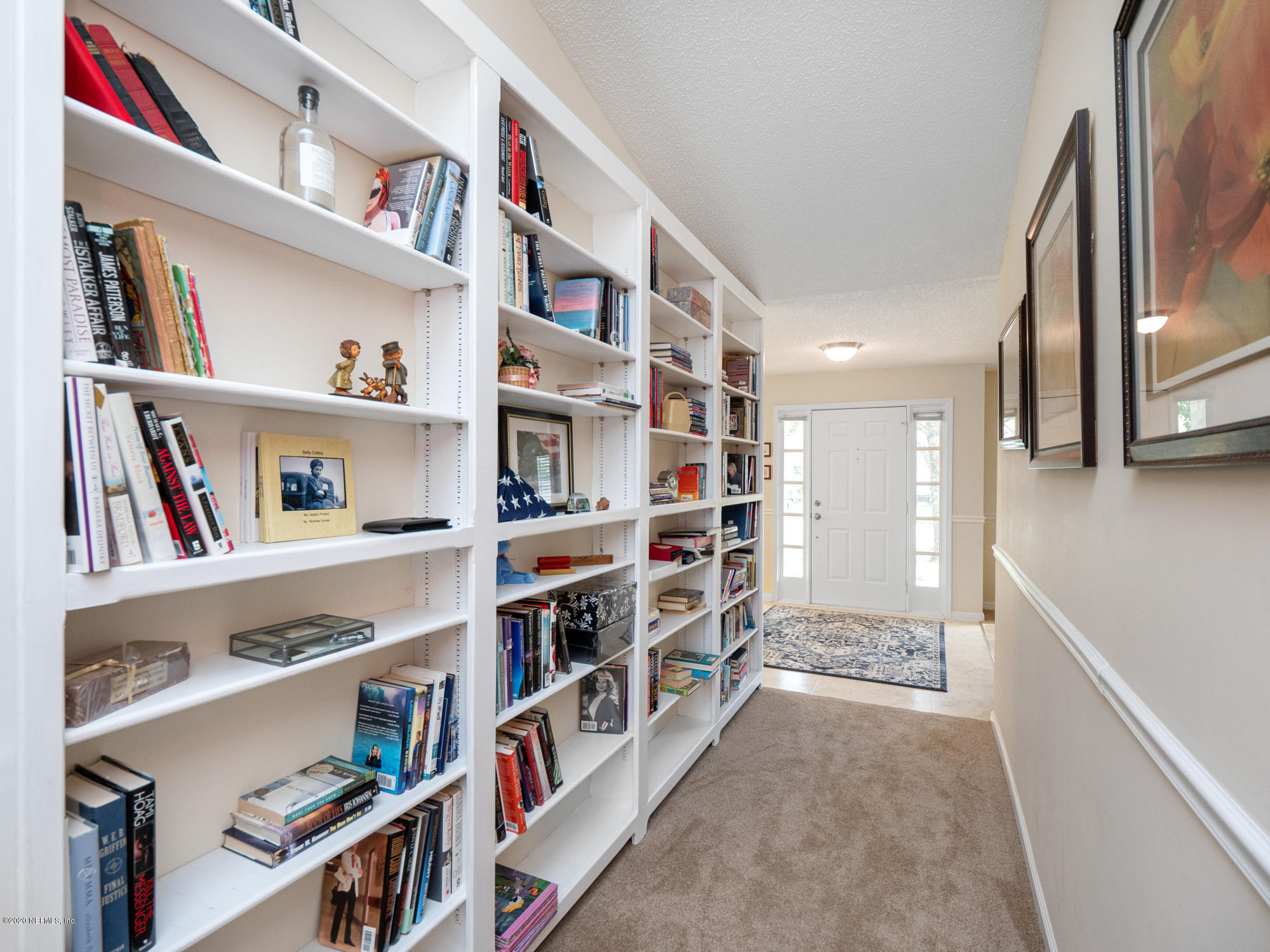 1826 Blue Ridge Drive Jacksonville, FL 32246 - Photo 5 of 27 Hallway with Built in Book Shelves