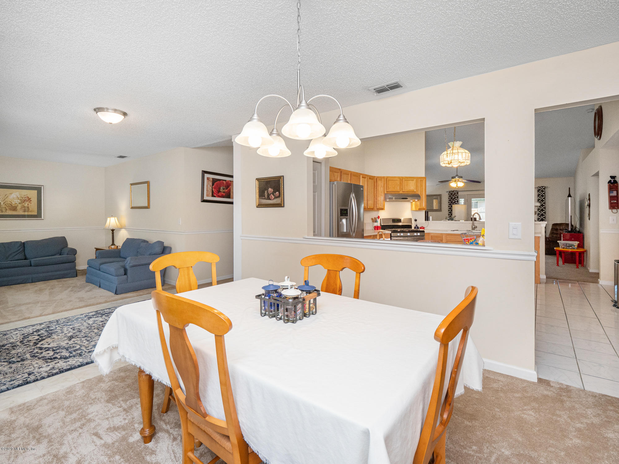 1826 Blue Ridge Drive Jacksonville, FL 32246 - Photo 7 of 27 Kitchen opening over looking dining room