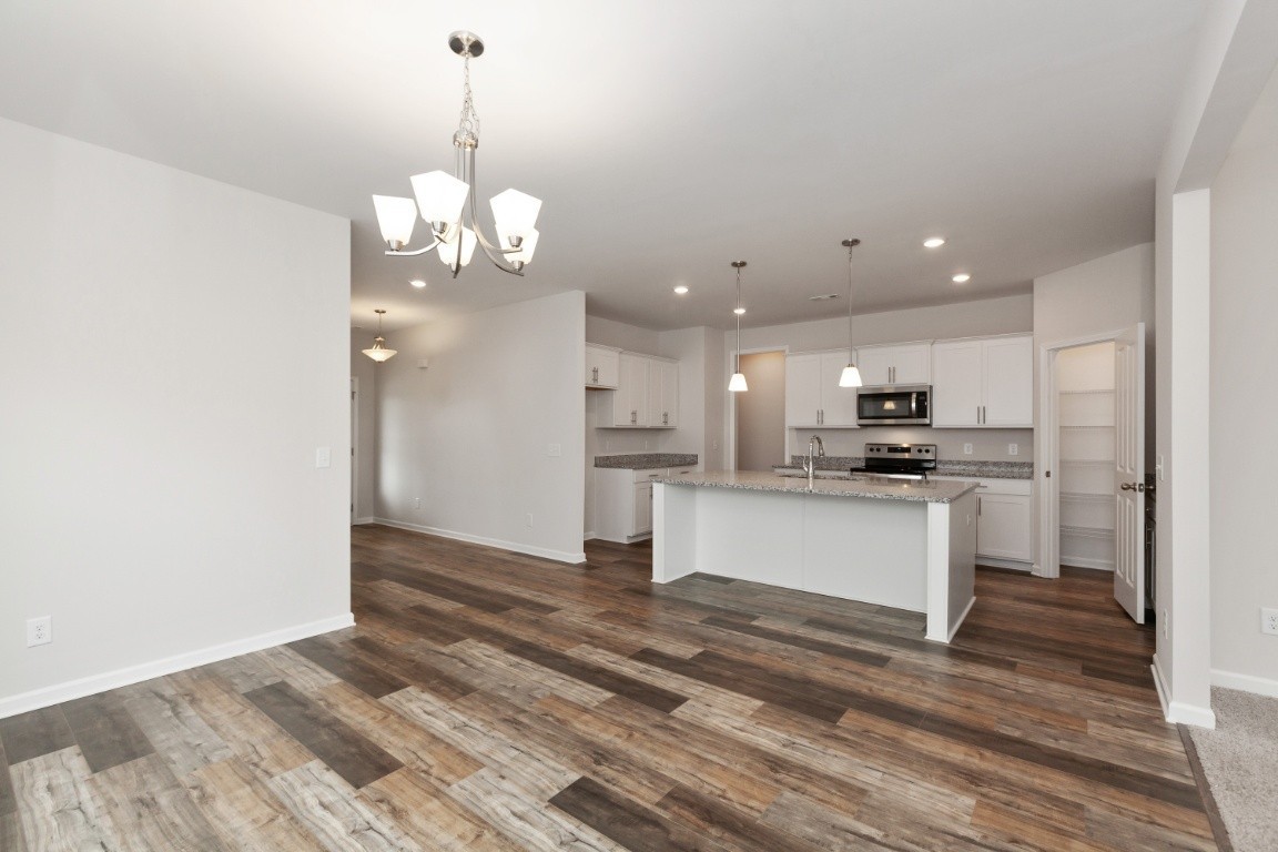 673 Castle Road Mount Juliet, TN 37122 - Photo 3 of 13 a view of kitchen with refrigerator and microwave