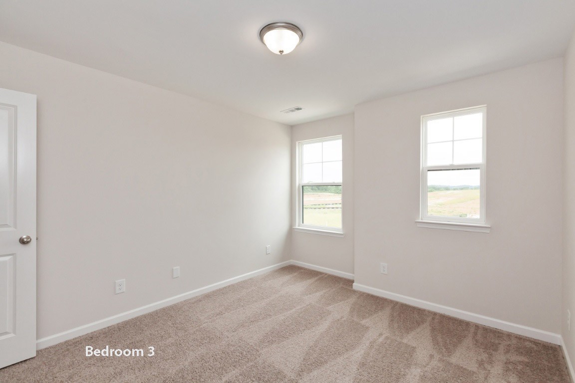 673 Castle Road Mount Juliet, TN 37122 - Photo 7 of 13 an empty room with windows
