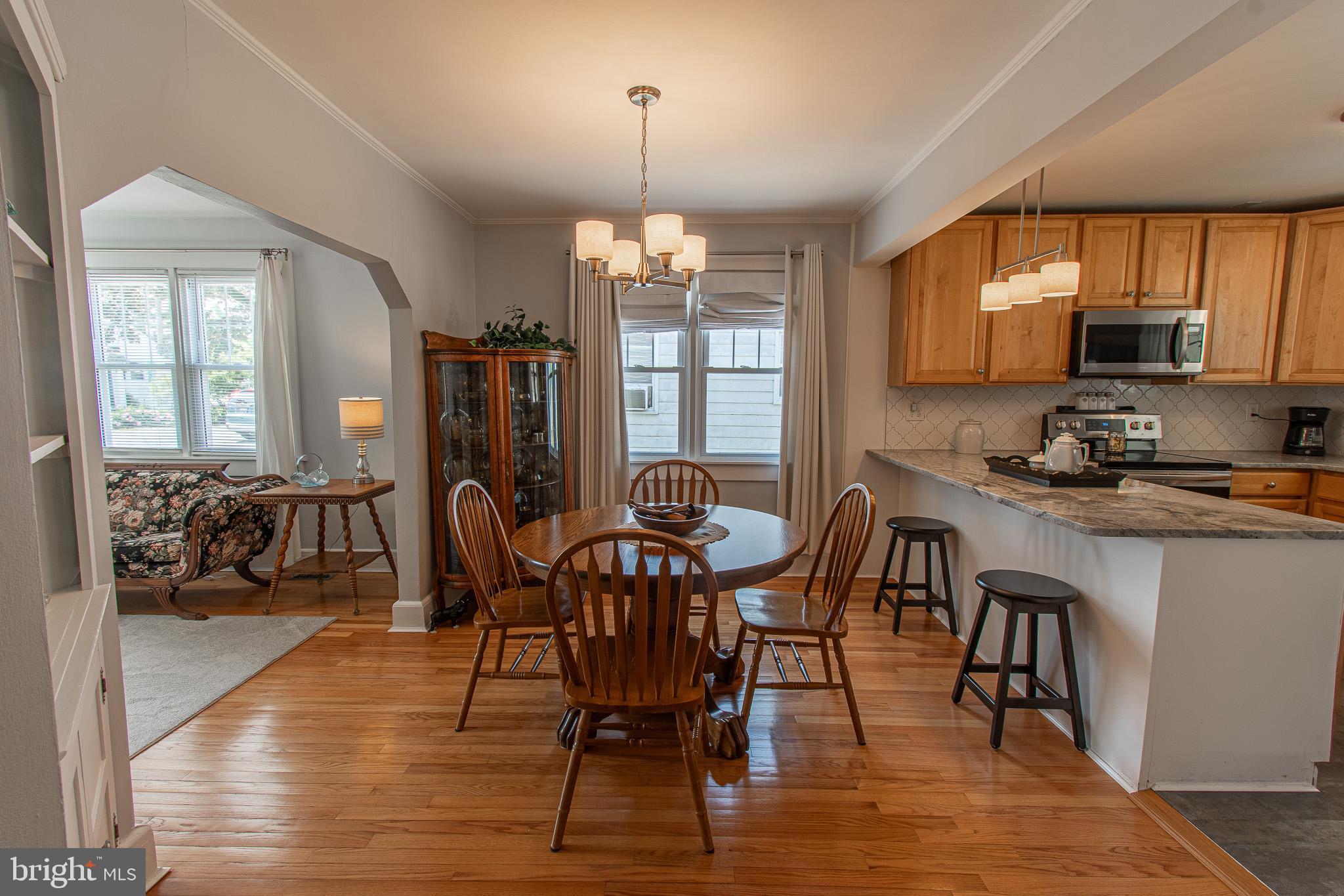 207 Crusader Road Cambridge, MD 21613 - Photo 22 of 76 a view of a dining room with furniture window and outside view