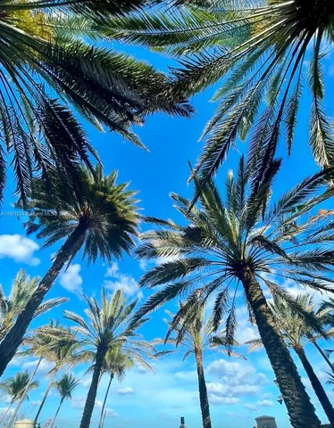 a view of swimming pool with outdoor seating