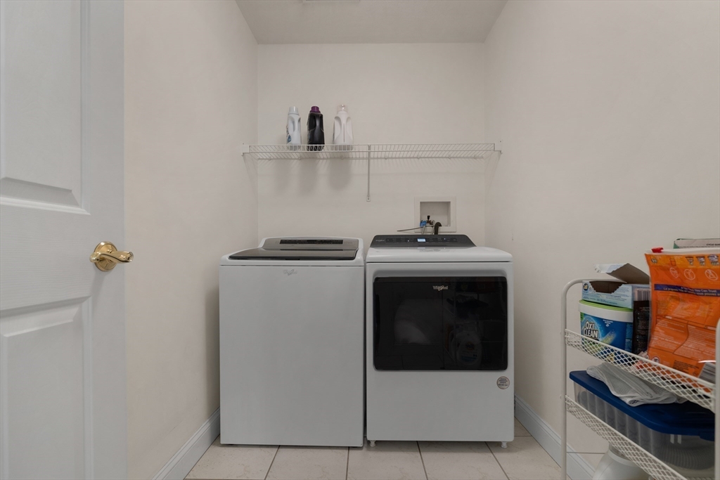 4 Coderre Way Andover, MA 01810 - Photo 27 of 35 a kitchen with a stove and a refrigerator