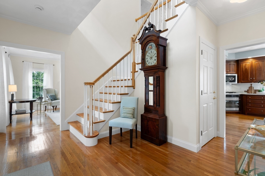 4 Coderre Way Andover, MA 01810 - Photo 4 of 35 a view of entryway dining room and hall with wooden floor