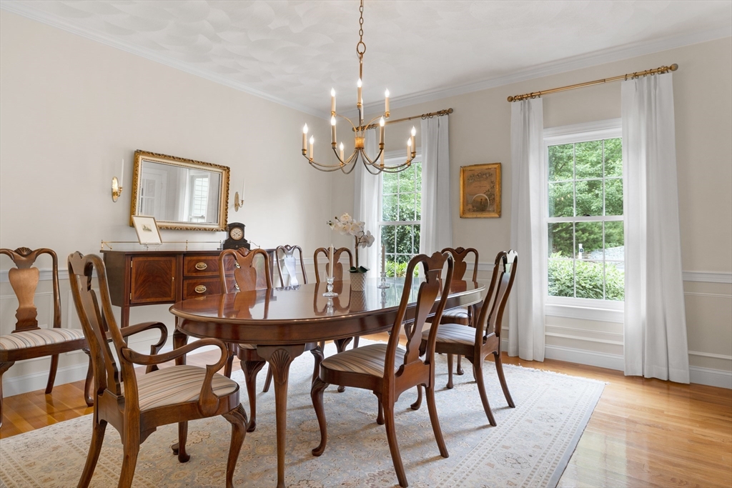 4 Coderre Way Andover, MA 01810 - Photo 9 of 35 a view of a dining room with furniture window and wooden floor