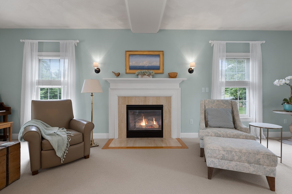 4 Coderre Way Andover, MA 01810 - Photo 10 of 35 a living room with furniture and a fireplace