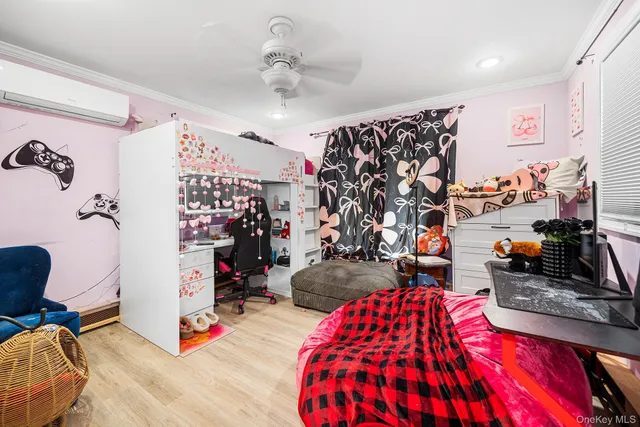 a view of a livingroom with furniture and toys