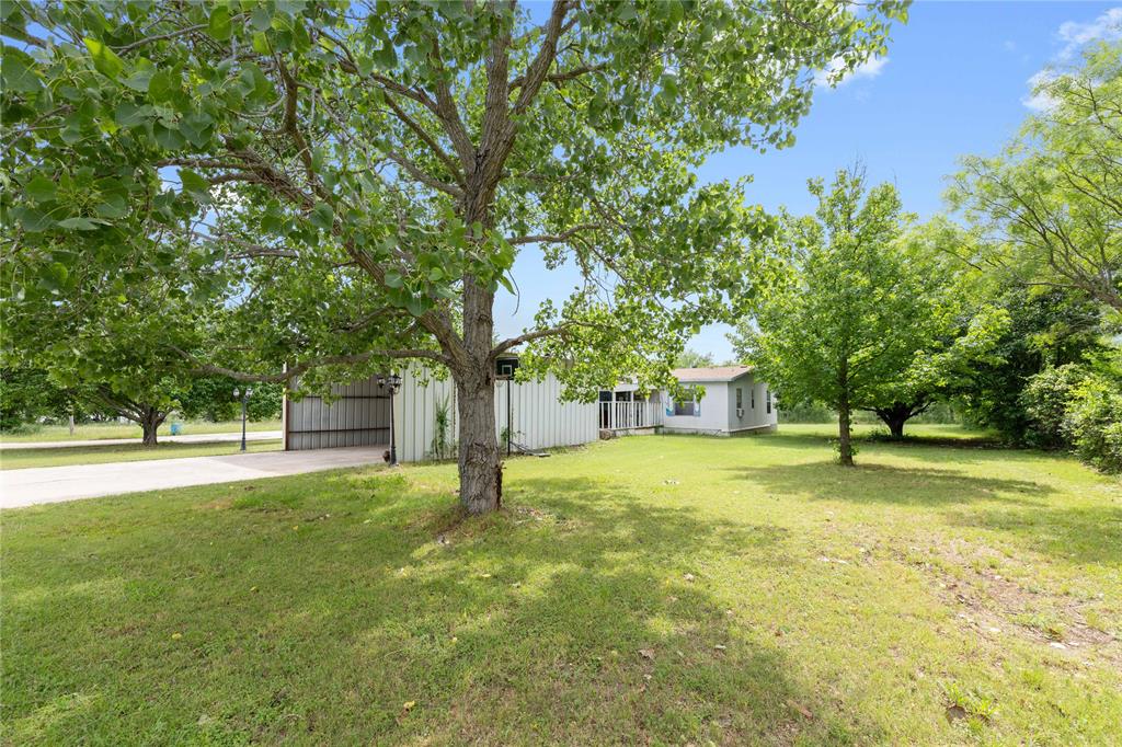 210 7th Street Blanket, TX 76432 - Photo 33 of 33 a swimming pool with trees in the background