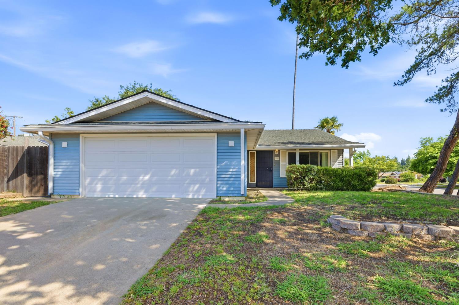6353 Edgerton Way Carmichael, CA 95608 - Photo 15 of 21 a front view of a house with a garden