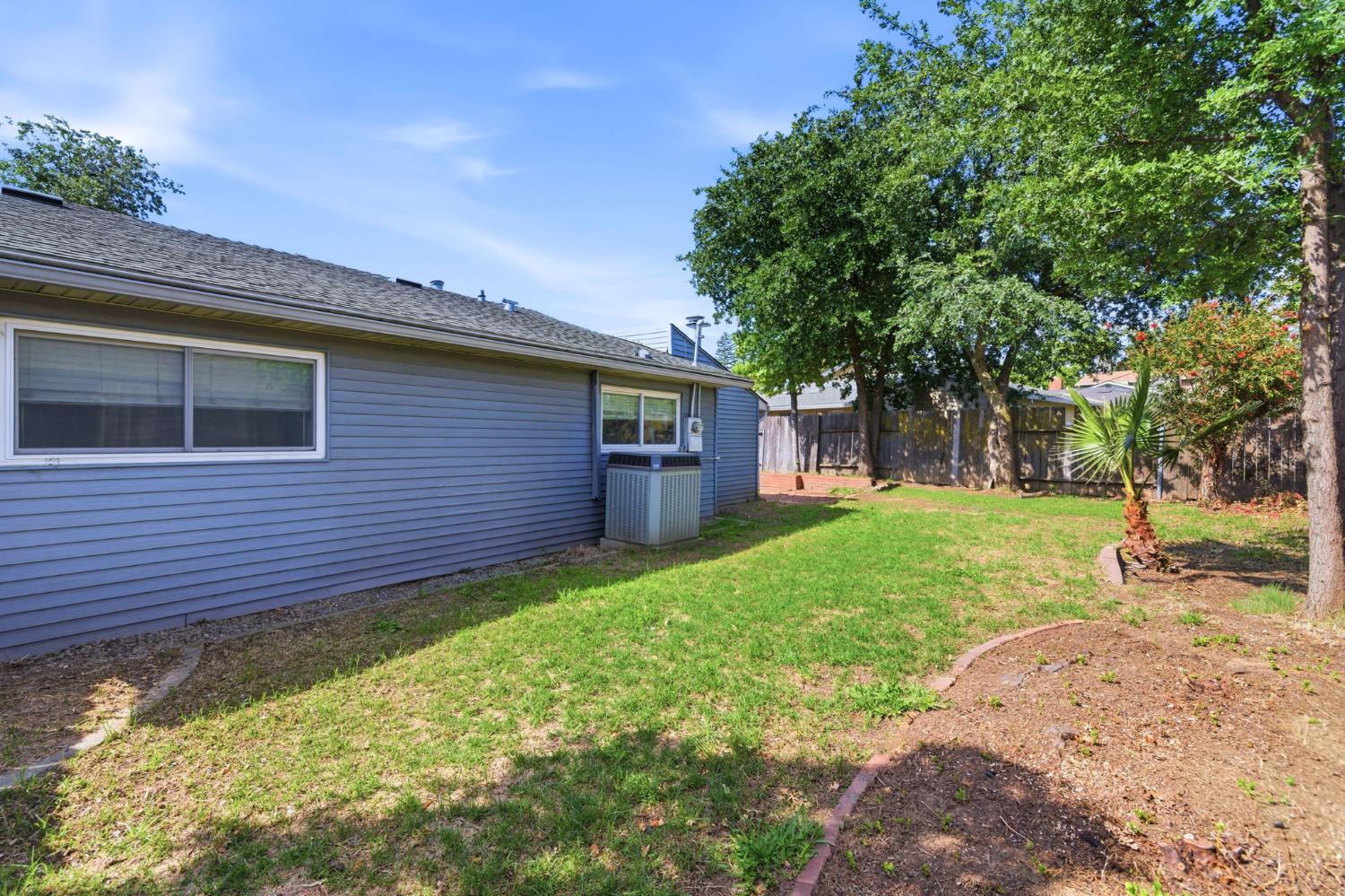 6353 Edgerton Way Carmichael, CA 95608 - Photo 19 of 21 a view of a backyard with a garden
