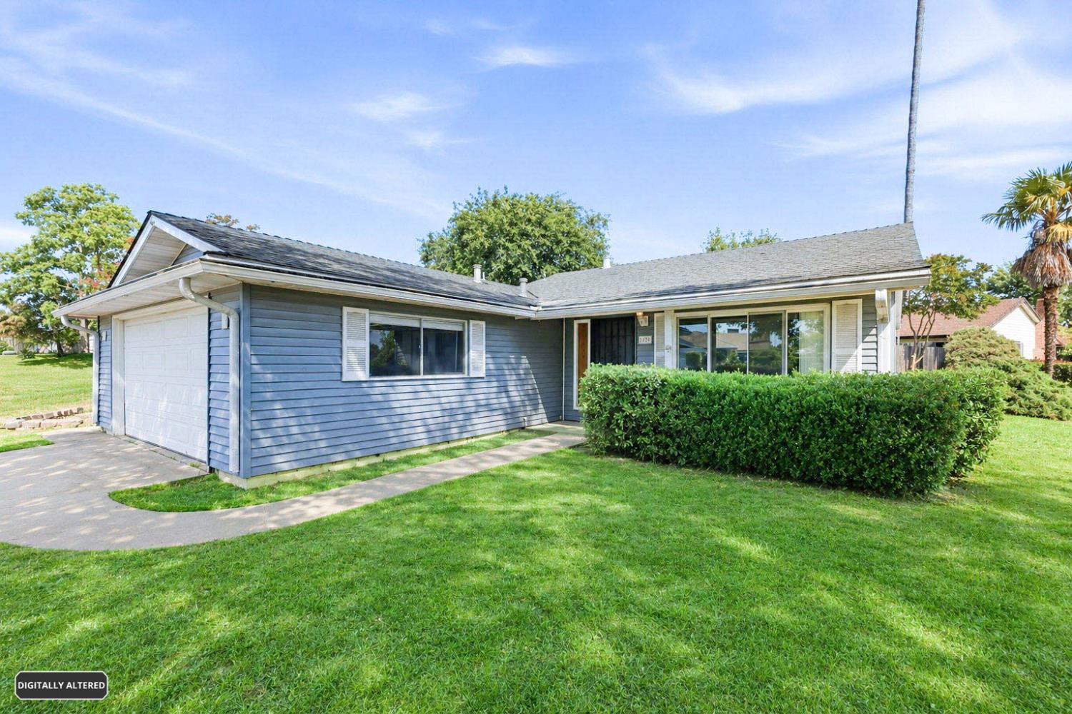 6353 Edgerton Way Carmichael, CA 95608 - Photo 3 of 21 a front view of a house with a yard
