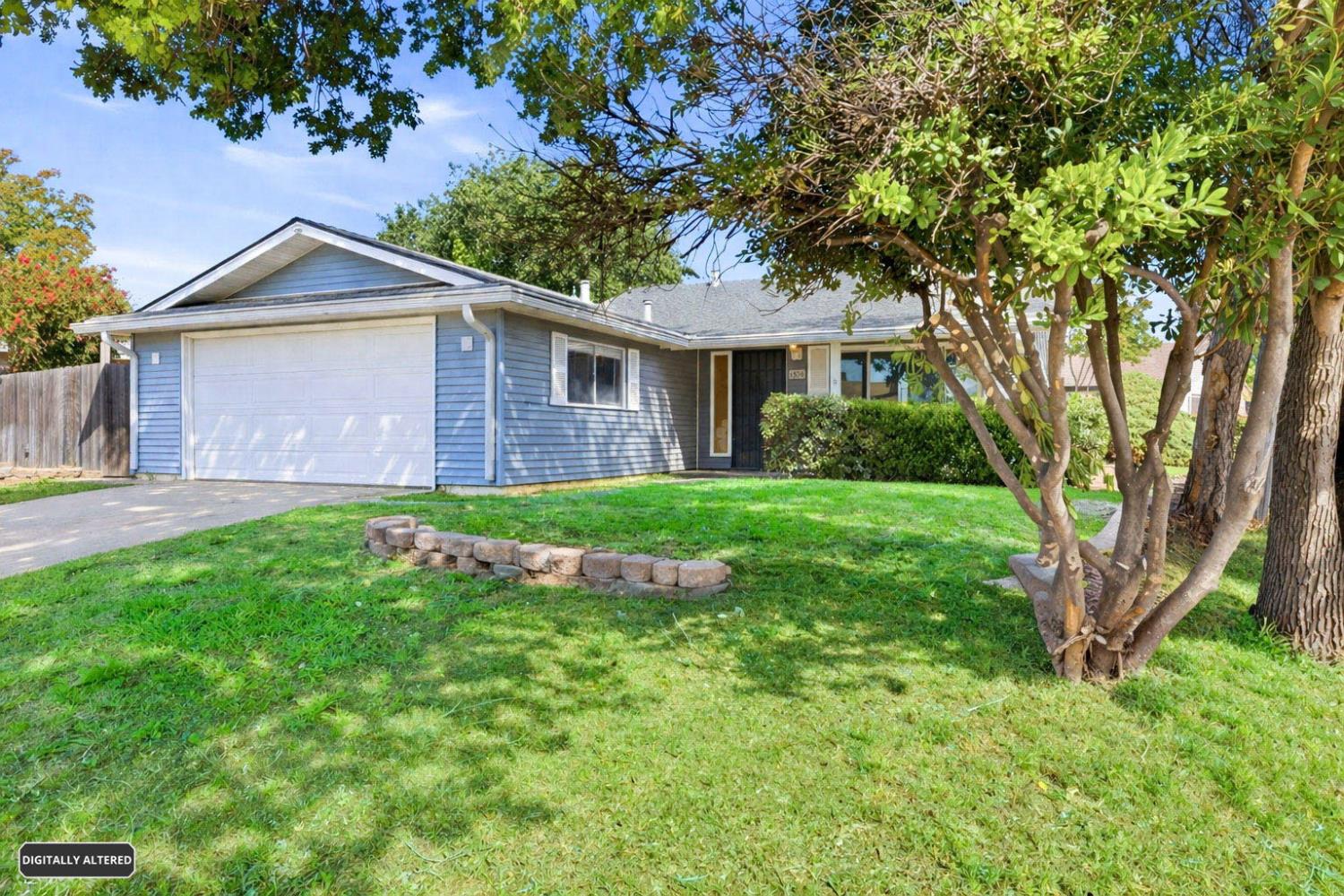 6353 Edgerton Way Carmichael, CA 95608 - Photo 5 of 21 a front view of house with yard and green space