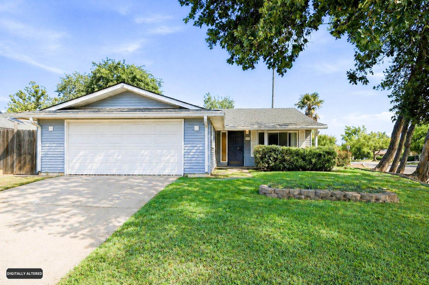 6353 Edgerton Way Carmichael, CA 95608 - Photo 6 of 21 a front view of a house with a yard