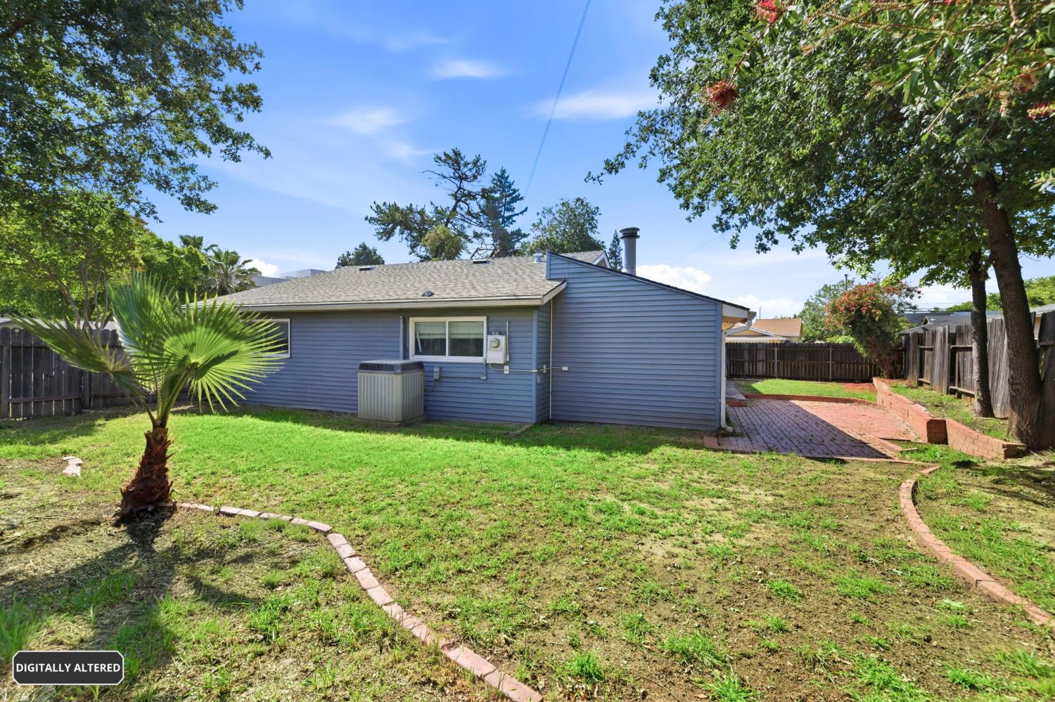 6353 Edgerton Way Carmichael, CA 95608 - Photo 8 of 21 a view of a house with a yard