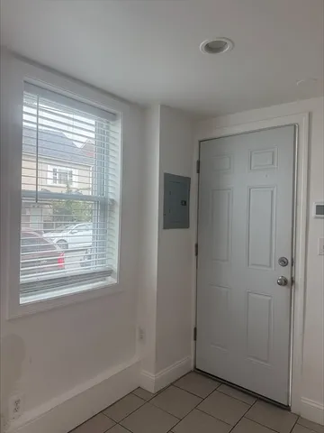 a kitchen with stainless steel appliances granite countertop a sink and a stove