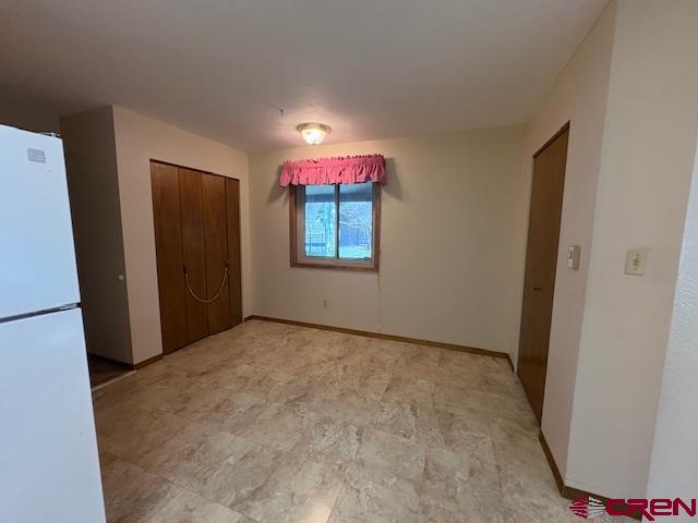 120 Camino Del Rio, Unit 35 Gunnison, CO 81230 - Photo 12 of 32 a view of an empty room and window