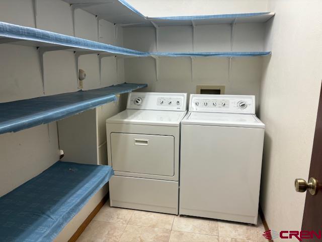 120 Camino Del Rio, Unit 35 Gunnison, CO 81230 - Photo 27 of 32 a utility room with dryer and washer