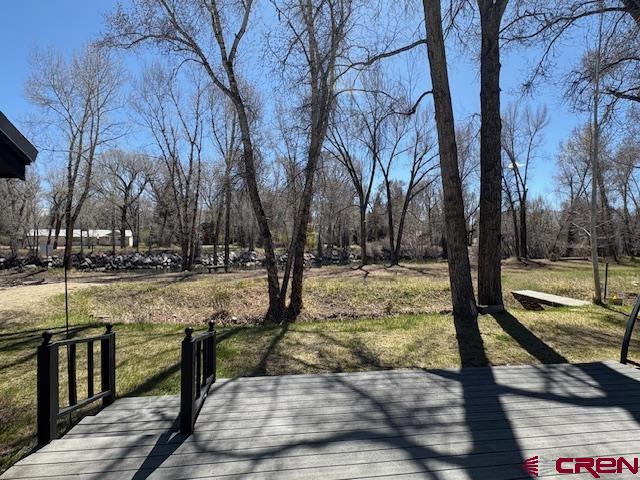 120 Camino Del Rio, Unit 35 Gunnison, CO 81230 - Photo 28 of 32 a view of outdoor space with trees