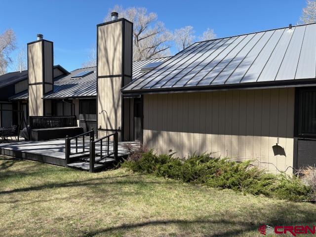 120 Camino Del Rio, Unit 35 Gunnison, CO 81230 - Photo 29 of 32 a front view of a house with garden