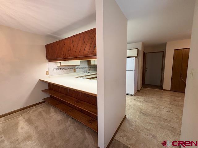 120 Camino Del Rio, Unit 35 Gunnison, CO 81230 - Photo 9 of 32 a bathroom with a sink and a mirror