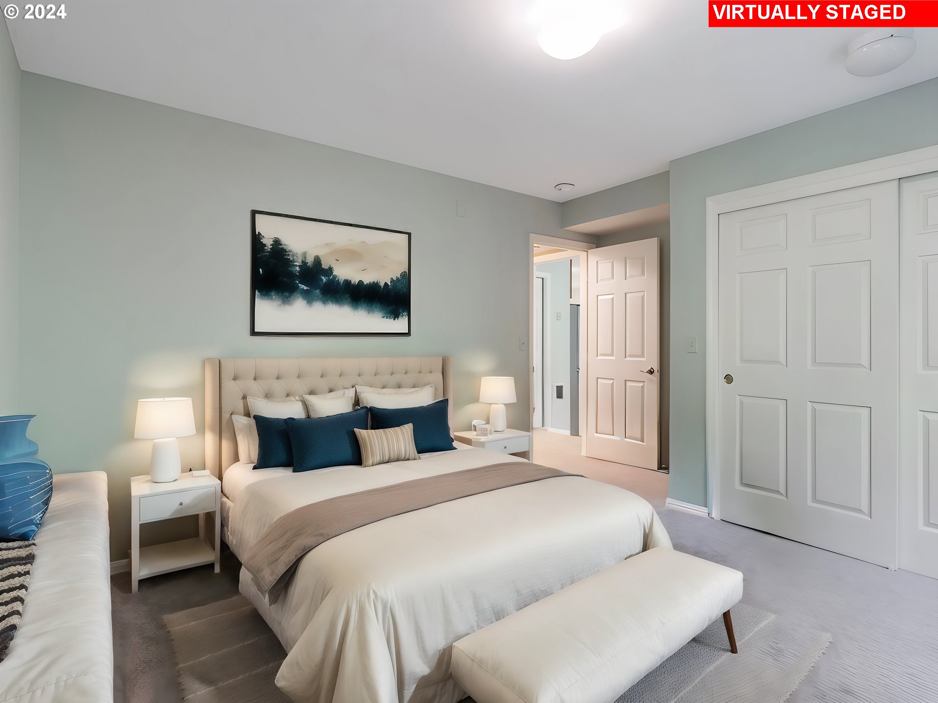 3209 Southwest Talbot Road Portland, OR 97201 - Photo 26 of 35 a bedroom with a large bed and a chandelier