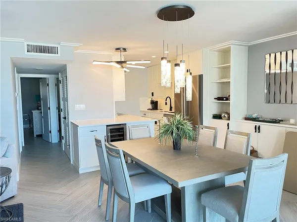 a view of a dining room and livingroom