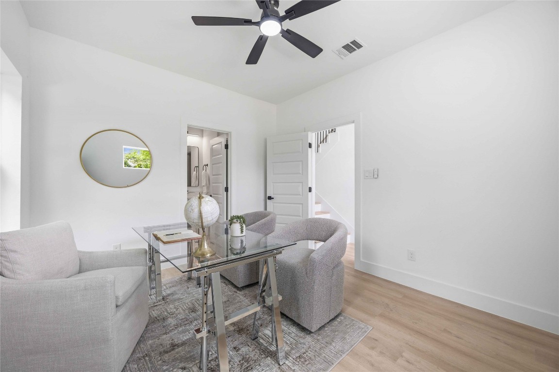3103 Lelia Street, Unit B Houston, TX 77026 - Photo 15 of 30 a living room with furniture a window and a fan