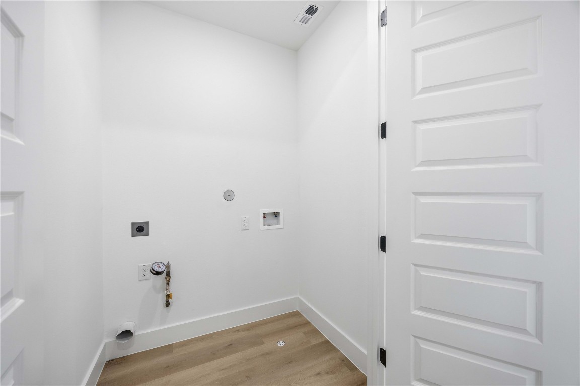 3103 Lelia Street, Unit B Houston, TX 77026 - Photo 17 of 30 a view of small space with racks on the wall