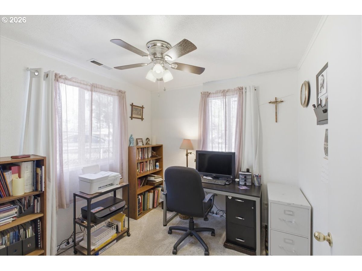 2295 Cedar Street Sweet Home, OR 97386 - Photo 20 of 32 a view of a workspace with furniture and a window